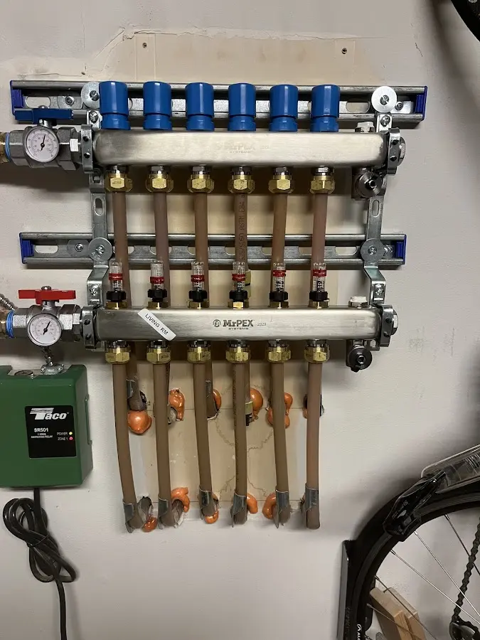 Plumber performing Water Heater Repair at a residential property in South Hadley